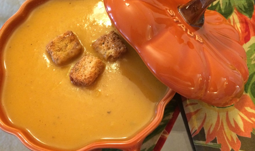 Butternut Squash Soup with croutons in a pumpkin decorative bowl